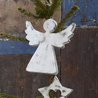 white wooden angel decoration by retreat home