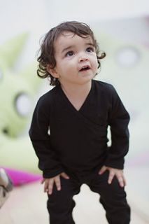 black organic cotton babygrow crossover neck by supernatural collections