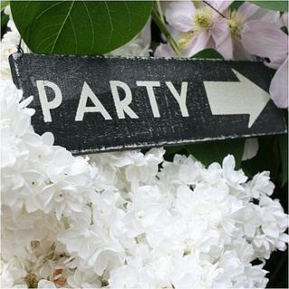 wooden painted "party" sign by chamomile barn