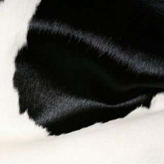 Pure Rugs Natural Cowhide Black and White Rug