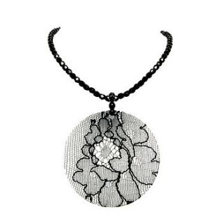 round lace pendant on beaded necklace by float jewellery
