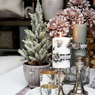 silver pillar candle holder by jodie byrne