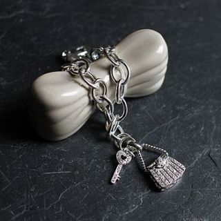 silver bag and key bracelet by tales from the earth