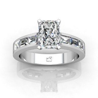 Platinum This fashionable flat shank engagement ring features six channel set Baguette Diamonds set East West to allure and impress 3/4 CTW. This item includes a free Cubic Zirconia center in the shape shown. Jewelry