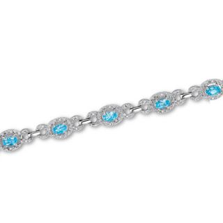 Previously Owned   Blue Topaz and Diamond Bracelet in Sterling Silver
