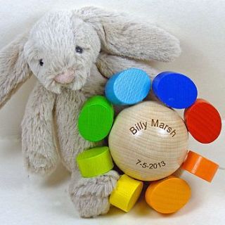 muliticouloured wooden baby rattle by wooden keepsakes