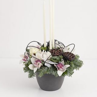 christmas orchid candle centrepiece by the flower studio