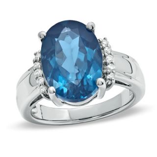Oval London Blue Topaz and 1/10 CT. T.W. Diamond Ring in Sterling