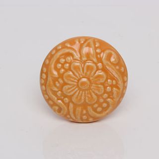 orange ceramic revival flower knob by trinca ferro