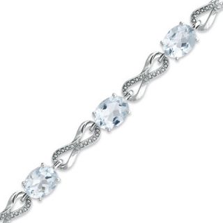Oval Aquamarine and Diamond Accent Knot Bracelet in Sterling Silver â