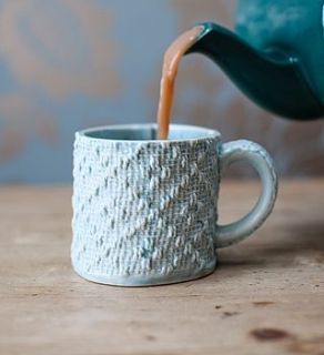 porcelain mug with textile textured design by clare gage