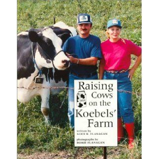 Raising Cows on the Koebels' (Our Neighborhood (Childrens Press Paperback)) Alice K. Flanagan, Romie Flanagan 9780516264707 Books