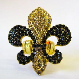 Black & Gold Rhinestone Fleur de Lis with Gold Metal "Stretch" Ring. Fleur de Lis is approximately 2 inch tall & 2 inch wide   Celebrate Louisiana Recovery, The New Orleans Saints Football Team, & The Rebirth of New Orleans with Lots 