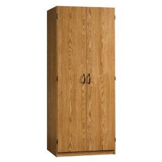 Shop Sauder Beginnings Wardrobe/Storage Cabinet in Oregon Oak Finish at the  Furniture Store. Find the latest styles with the lowest prices from Sauder