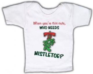 When you're this cute, who needs mistletoe?   Funny Baby T shirt Lap Tee Clothing